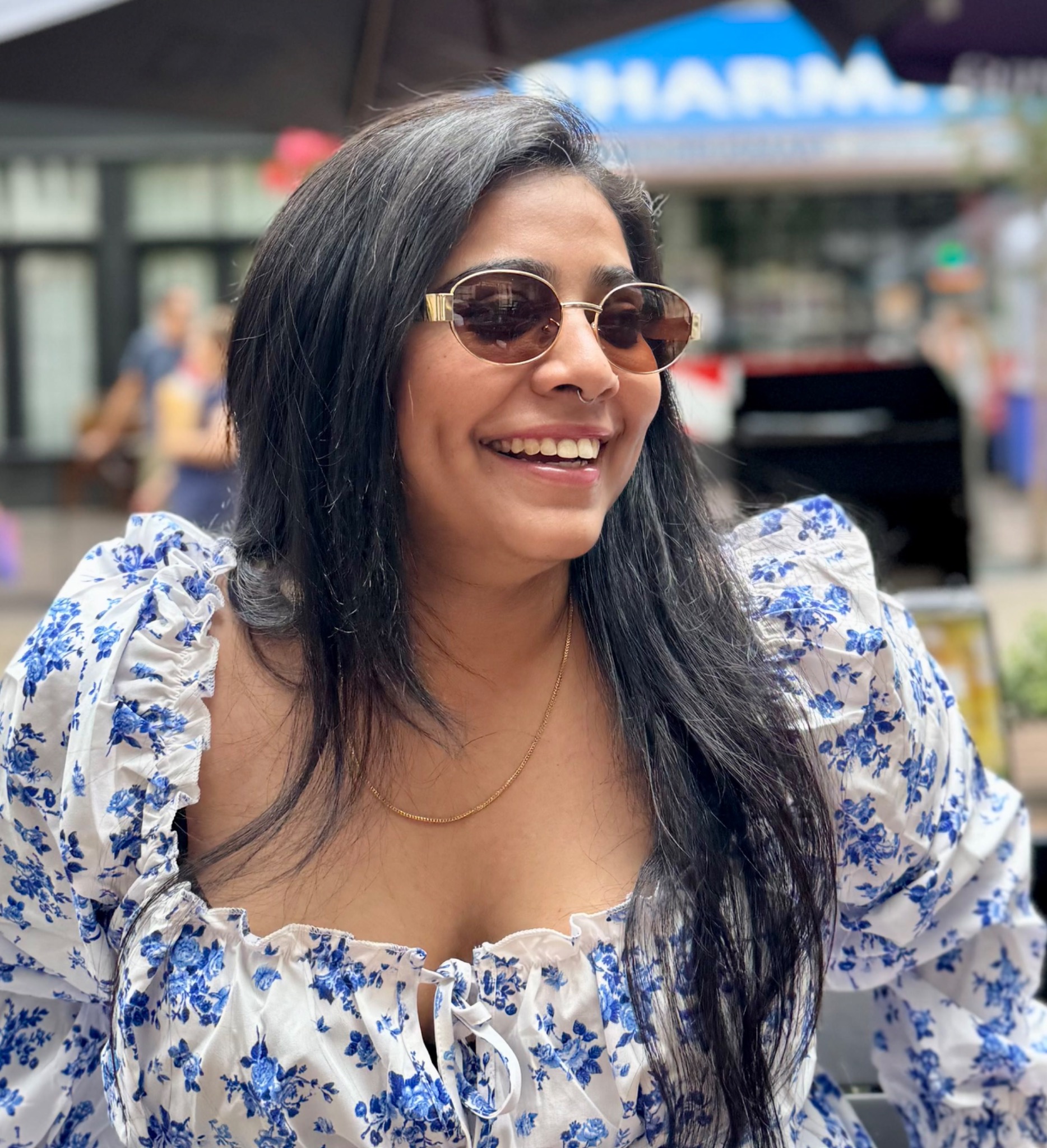 Jyoti Bhardwaj smiling outdoors in her original photograph